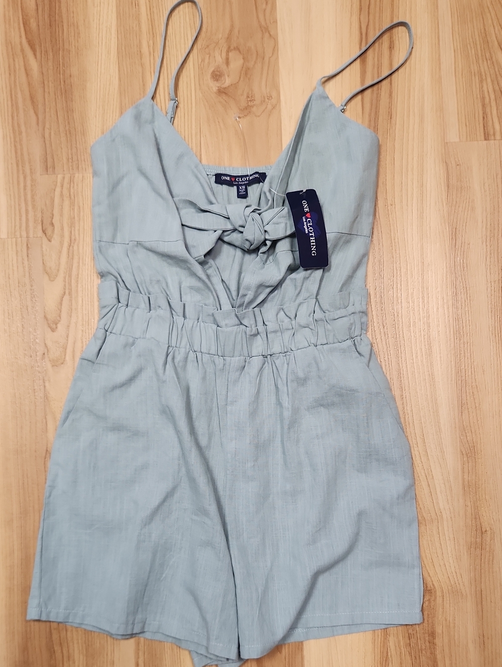 ONE Clothing LOS ANGELES sage green tie-front romper with adjustable straps